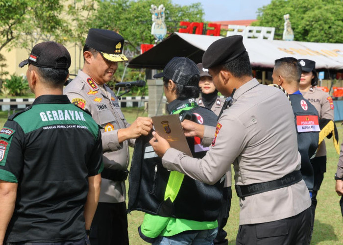 Kapolda Kalteng Pimpin Apel Kebangsaan: Polri, Buruh dan Ojek Online Kompak Jaga Harmoni